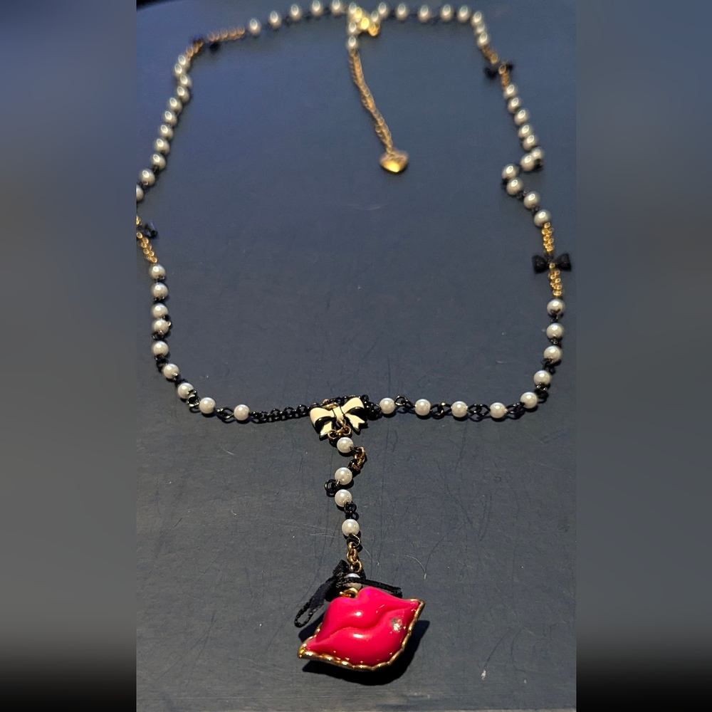 Betsey Johnson Black and Gold Necklace with a Lip Accent